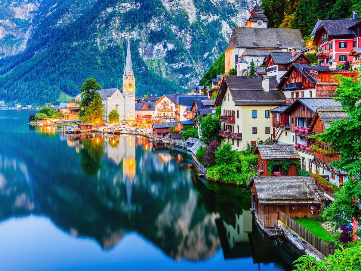 Vienna architecture and Alpine mountains with prepaid travel eSIM providing reliable mobile data connectivity.
