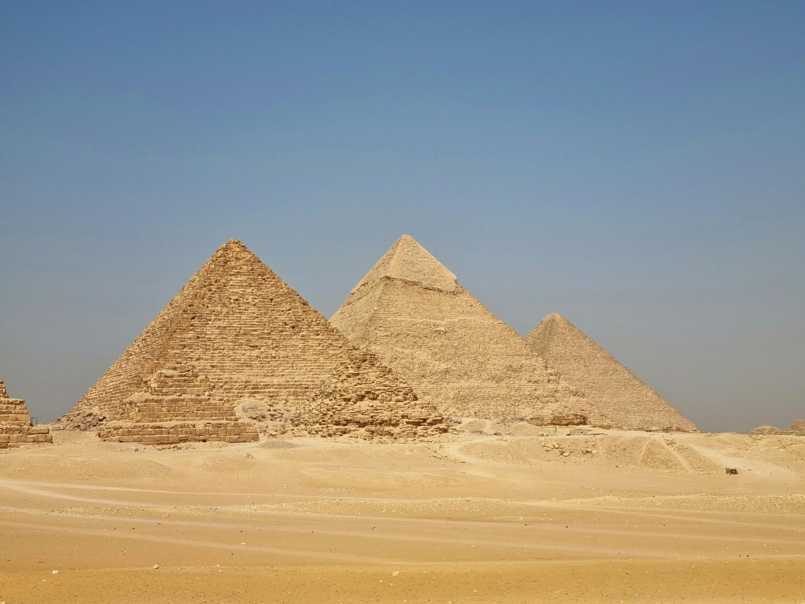 Giza pyramids and desert landscape with prepaid travel eSIM providing reliable mobile data connectivity.