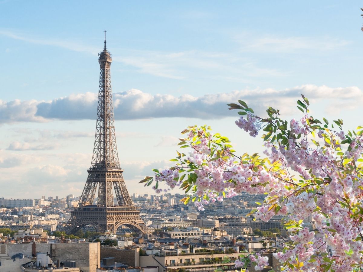 Paris skyline and the Eiffel Tower with prepaid travel eSIM providing reliable mobile data connectivity.