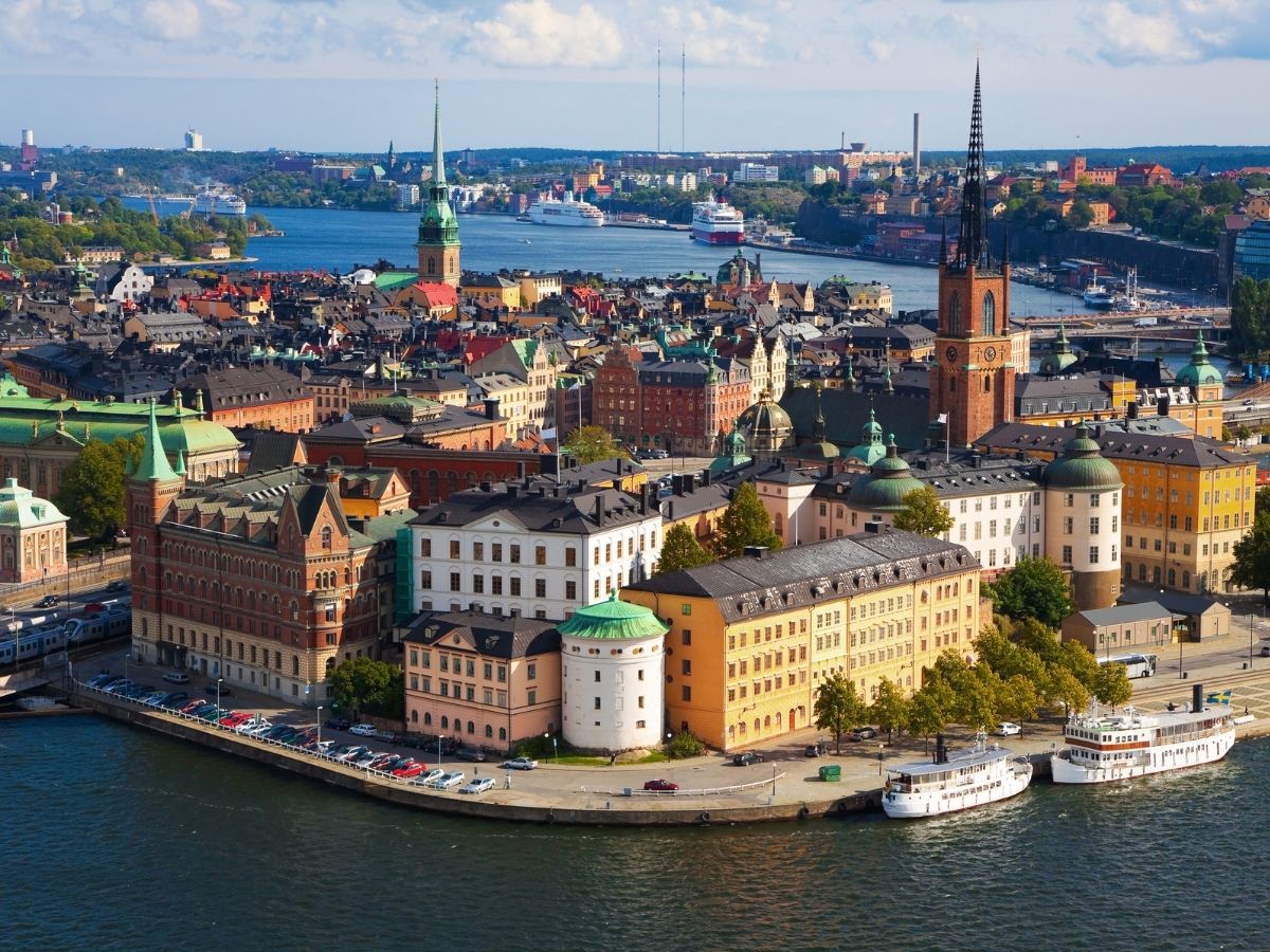 Stockholm waterfront and colorful historic buildings with prepaid travel eSIM providing reliable mobile data connectivity.