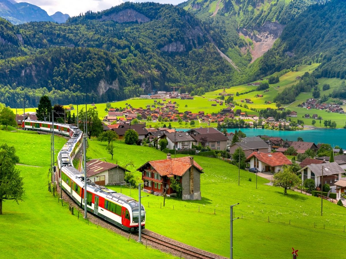 Swiss Alps and mountain villages with prepaid travel eSIM providing reliable mobile data connectivity.
