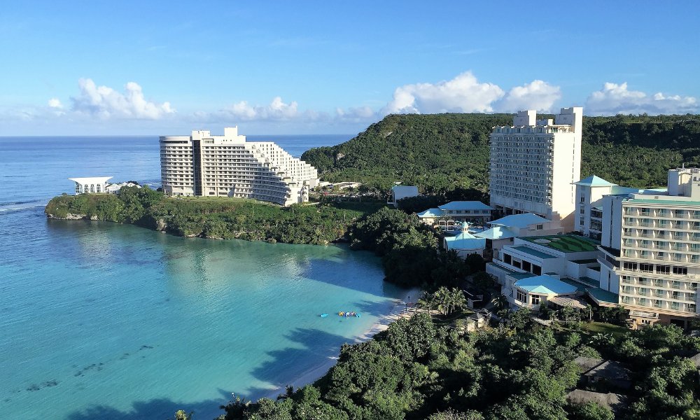 Guam skyline or landscape with prepaid travel eSIM providing fast mobile data connectivity